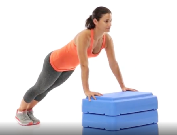 woman doing an incline push up