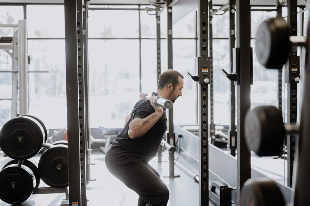 A Coachs Guide To Barbell Squats For Beginners Anytime Fitness